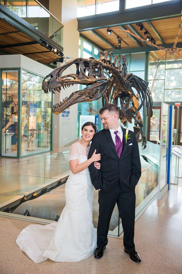 Rebecca Wedding Witte couple portrait in by the dino in the lobby