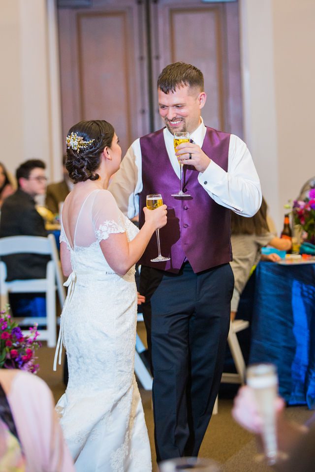 Rebecca Wedding Witte Museum reception couple toasts