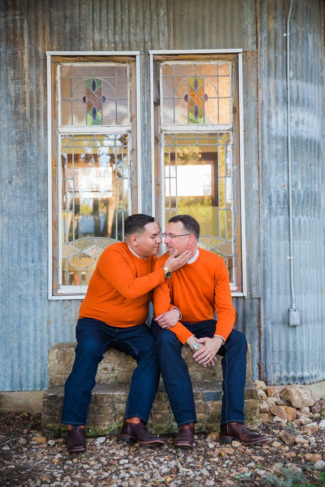 Will and Ross in the window at harper hills ranch wedding