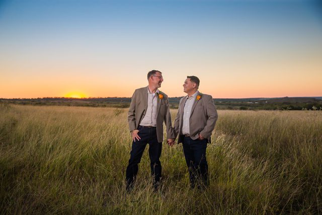 Will and Ross's sunset session at harper hills ranch wedding reception