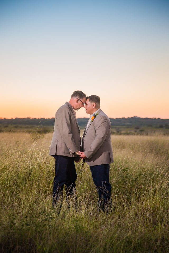 Will and Ross's sunset session at harper hills ranch wedding