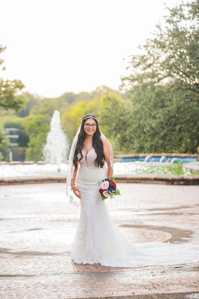 Bethany bridal at the McNay in front of the fountain hazy full length portrait