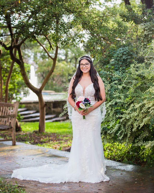 Bethany's bridal portrait at the McNay on the path with the fountain