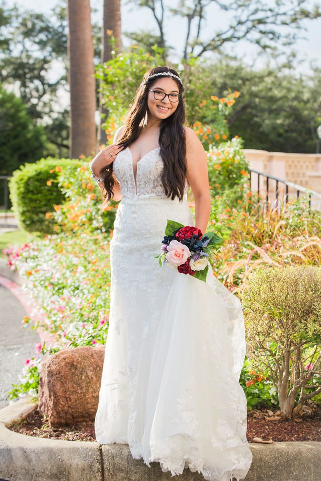 Bethany's bridal portrait at the McNay with the flowers in the sun