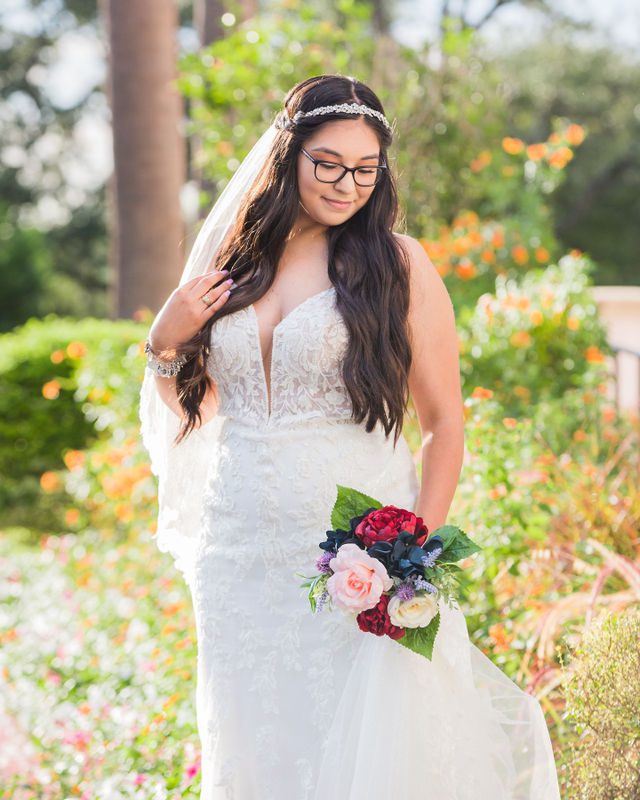 Bethany's bridal portrait at the McNay with the flowers looking down