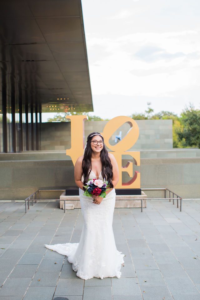 Bethany's bridal at the McNay with the LOVE portrait walking