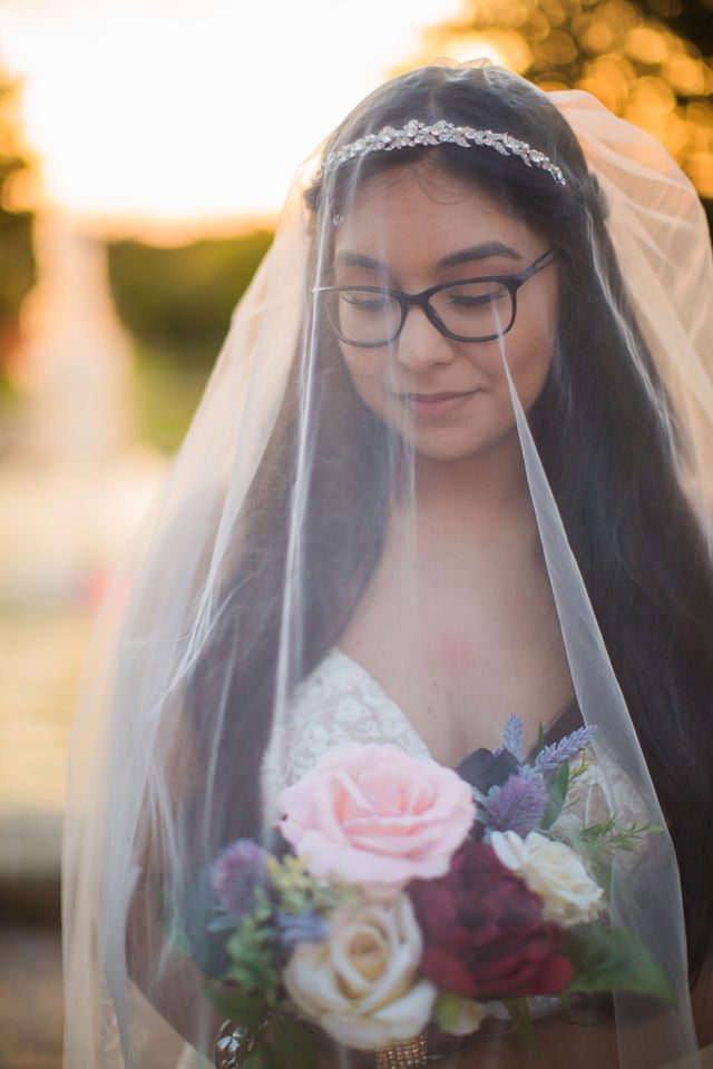 Bethany's bridal portrait at the McNay under veil