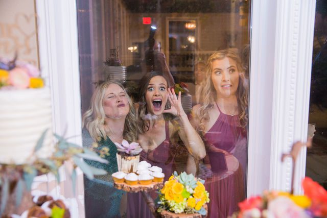 Celeste's wedding reception cake fun bridesmaids at Abbott house