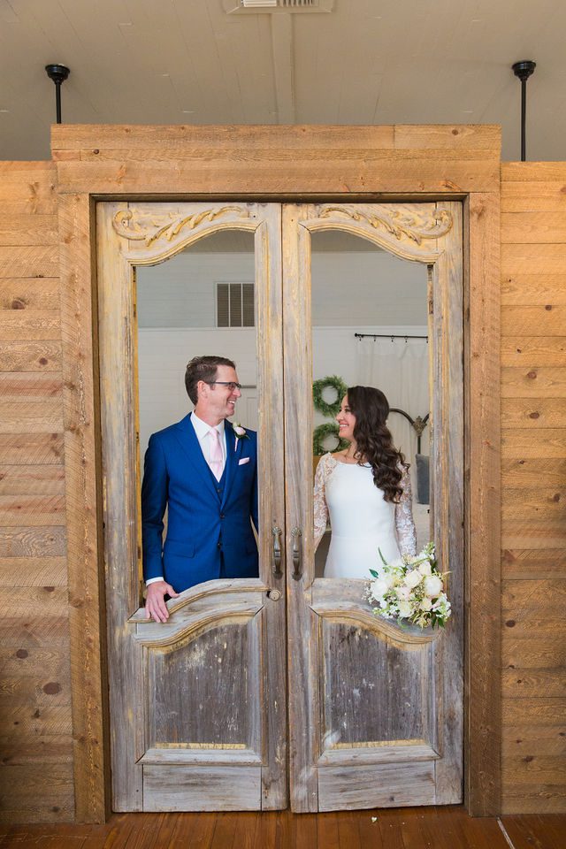 Ann and Jud wedding, Kendall Inn in Boerne portrait in the chapel doors fun