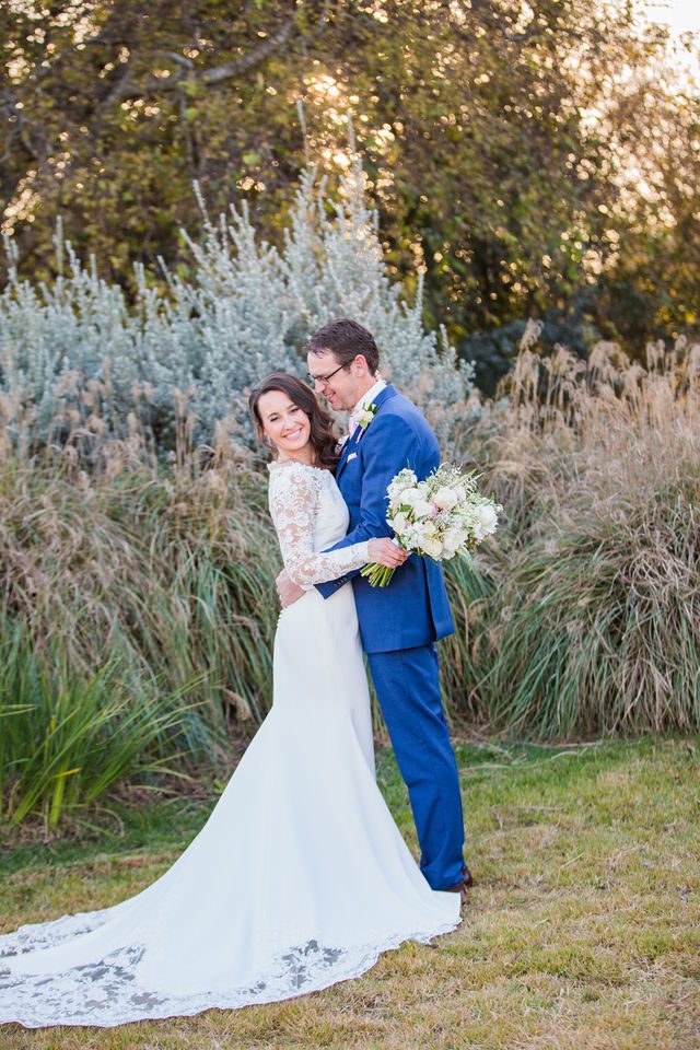 Ann and Jud's wedding, Kendall Inn in Boerne in the sun by the pampas grass