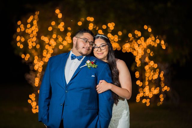 Bethany and David wedding in the lights at gazebo at Los Encinos