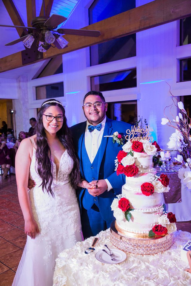 David and Bethany's cake cutting at wedding reception at Los Encinos