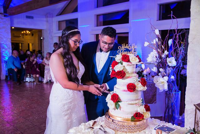 David and Bethany's cake cutting at wedding at Los Encinos