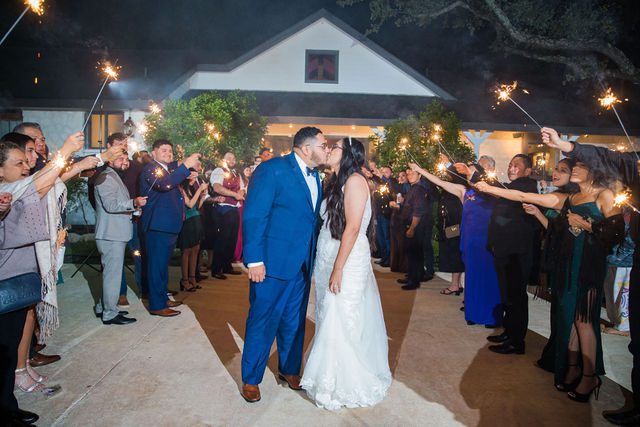 David and Bethany's sparkler exit kiss wedding reception at Los Encinos