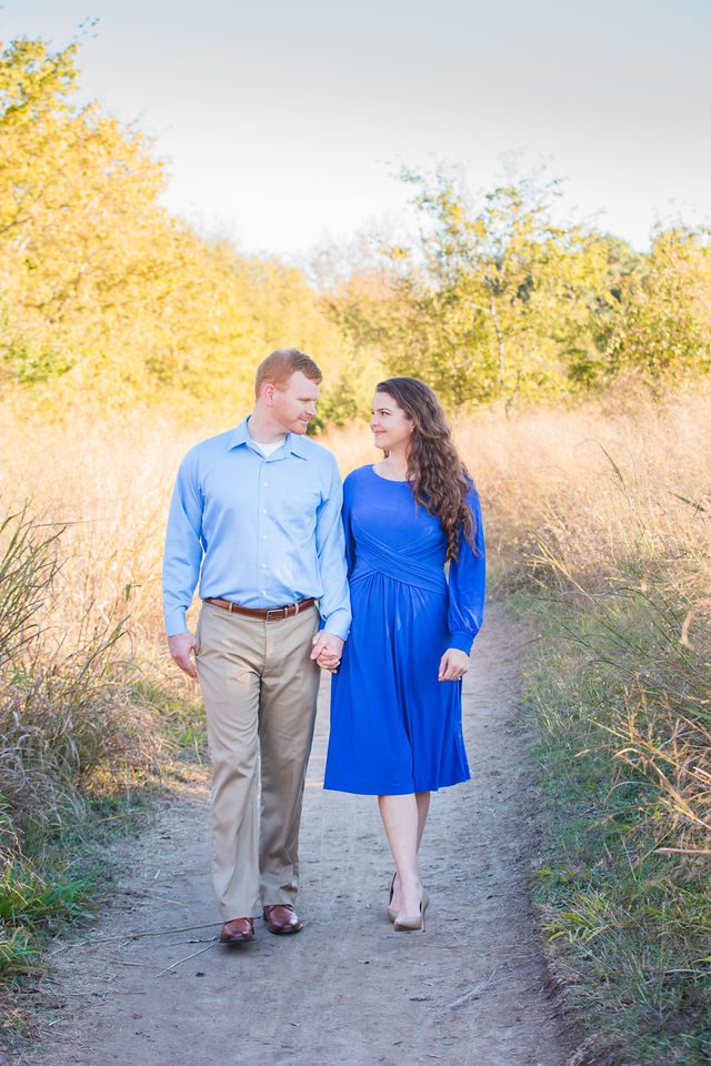 Coltan and Stephanie's the engagement at Cibolo Natural Area walking on the path