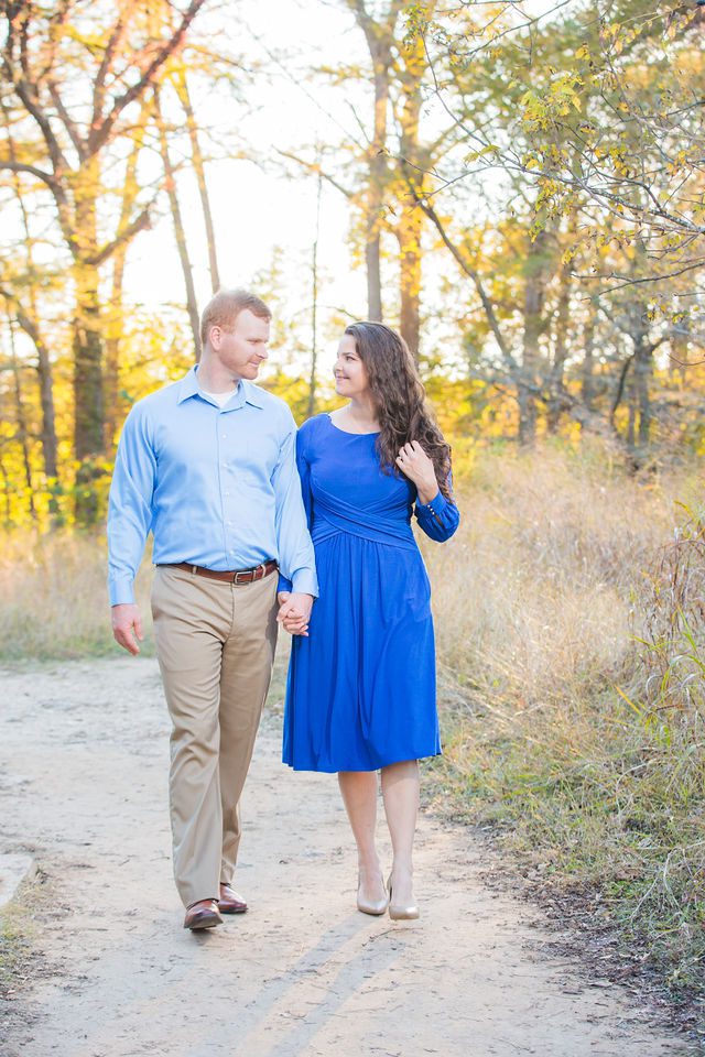 Coltan and Stephanie's the engagement at Cibolo Natural Area walking in the sun