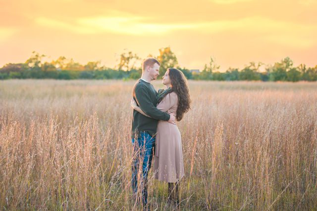 Coltan and Stephanie's the engagement at Cibolo Natural Area sunset in the grass