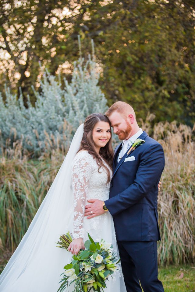 Stephanie's wedding at the Kendall Inn in Boerne couple portrait by pampas grass