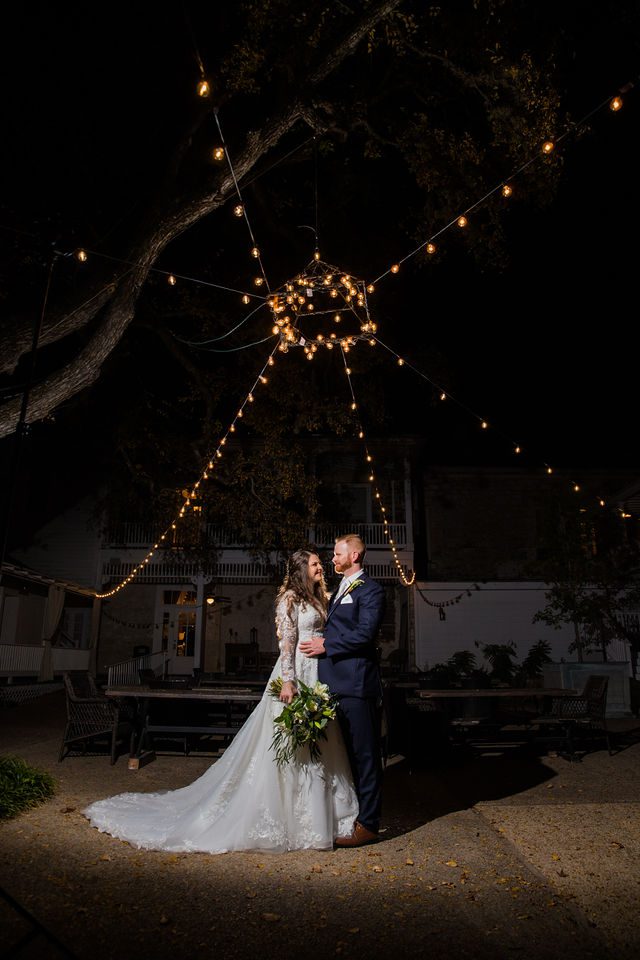 Stephanie's wedding at the Kendall Inn in Boerne dramatic night and lights portraits
