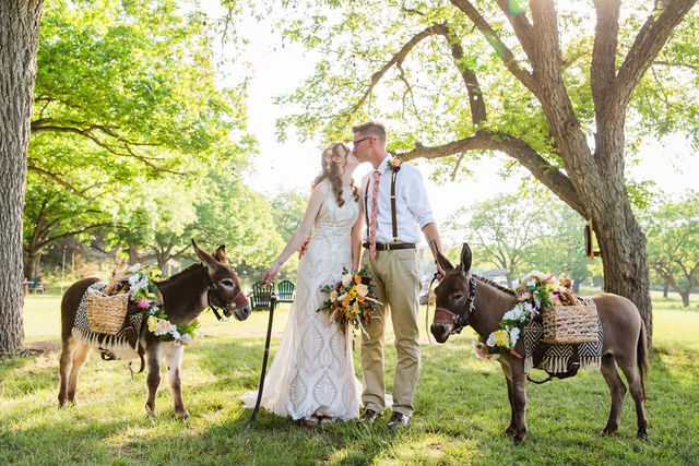 Haley's Wedding at Elm Pass Woods bride and groom with the burros