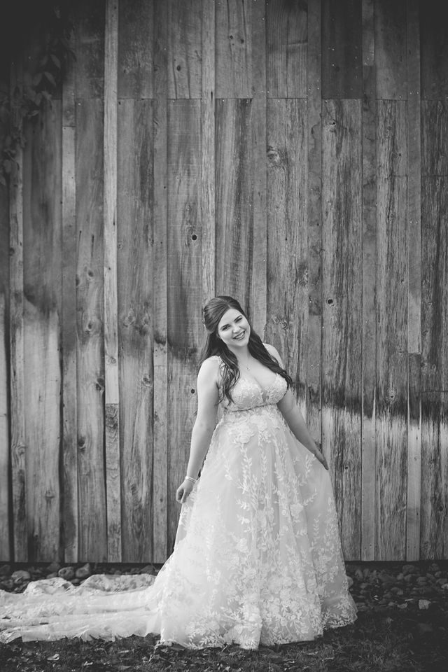 Meagan Bridal at the Gruene Hall on the wood wall black and white