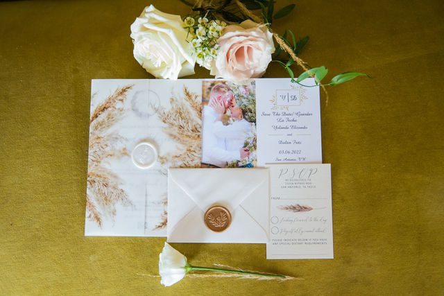 Yoli's wedding invitation at Canyon Springs in the ballroom