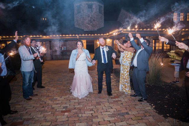 Yoli's and Daltin wedding reception sparkler exit at Canyon Springs