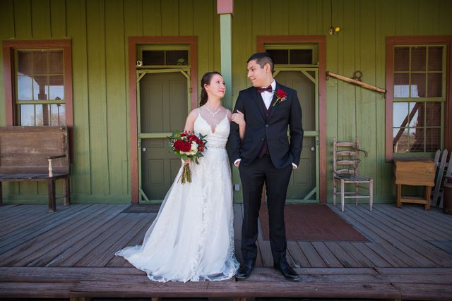 Allison wedding at Hofmann Ranch bride and groom portrait front porch post