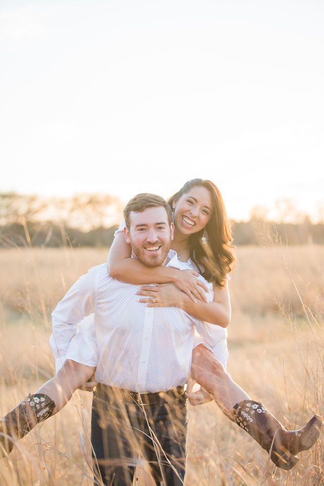 Bethany and Adam engagement piggy back ride at Cibolo Natural Area
