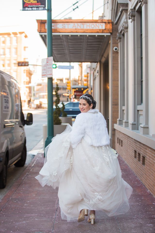 Bonnie's Bridal at the St Anthony Hotel on the sidewalk running away