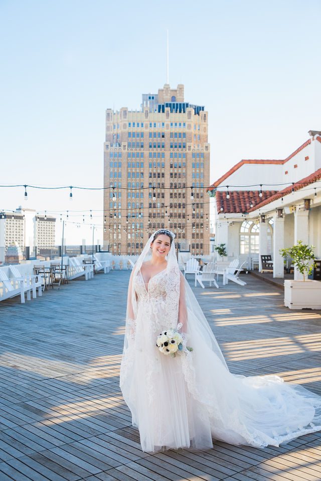 Bonnie's Bridal at the St Anthony Hotel on the rooftop with Frost building