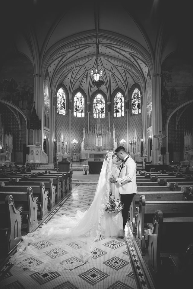 Bonnie's wedding black and white portrait at OLLU Sacred Heart Chapel