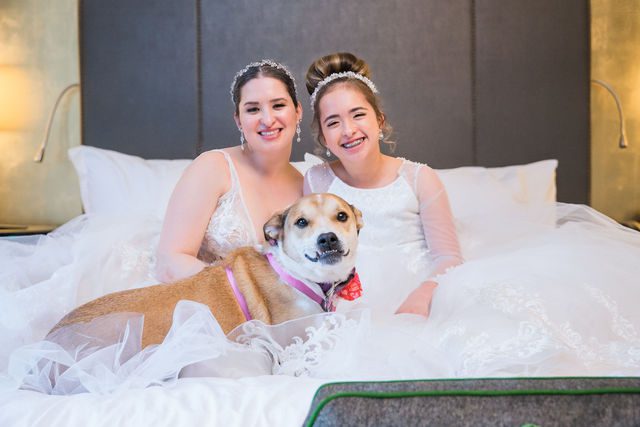 Bonnie's wedding at St Anthony hotel bride with her dog and daughter