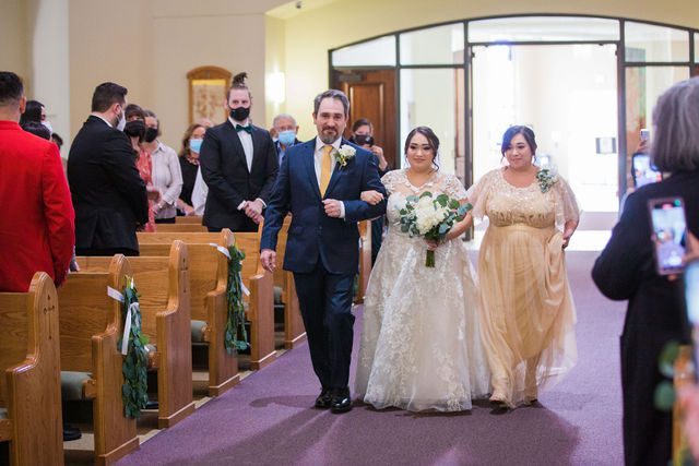 Chloe's San Antonio wedding St. Dominic's Catholic Church bride walking down the aisle