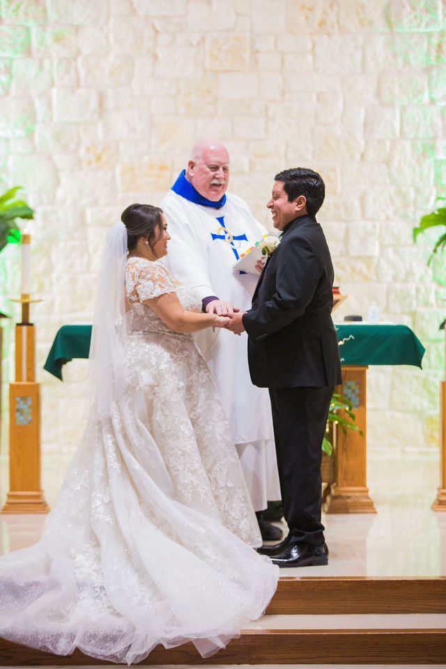 Chloe's San Antonio wedding ceremony at St. Dominic's Catholic ring exchange