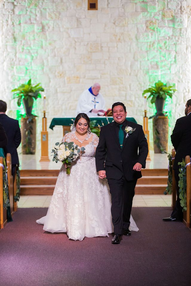 Chloe's San Antonio wedding ceremony exit at St. Dominic's Catholic