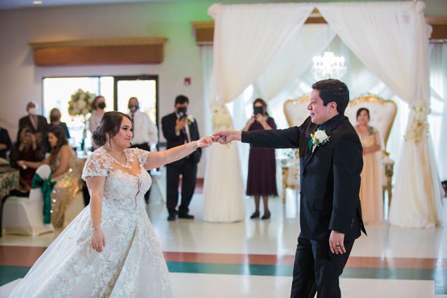 Chloe's San Antonio wedding reception at Las Fuentes couple fist dance swing