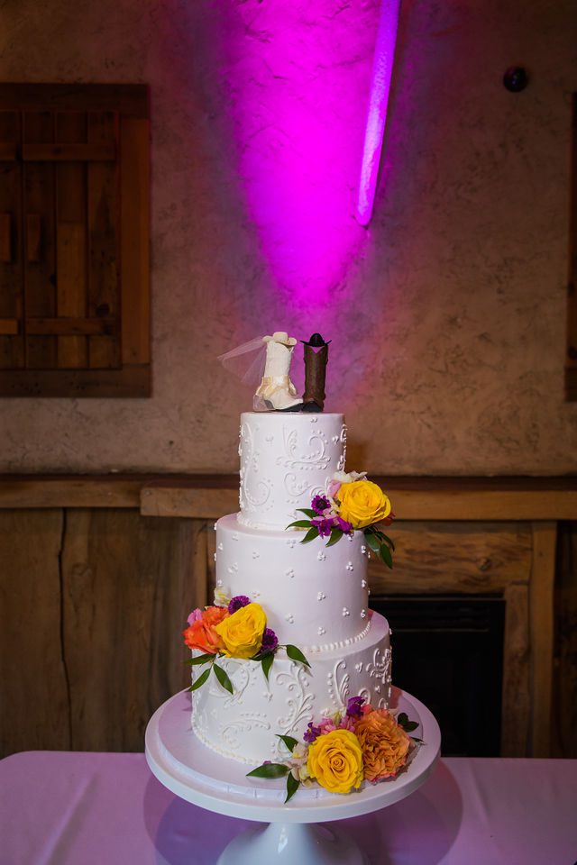 Liz's wedding at Enchanted Springs Ranch brides cake