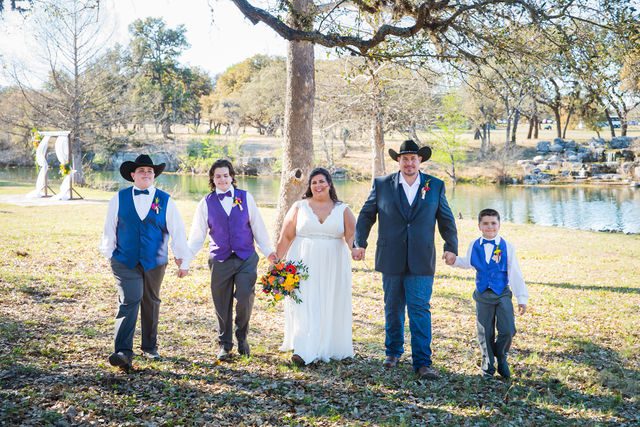 Liz's wedding at Enchanted Springs Ranch family walking portrait