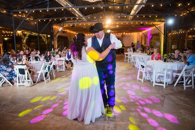 Liz's wedding at Enchanted Springs Ranch first dance with lights