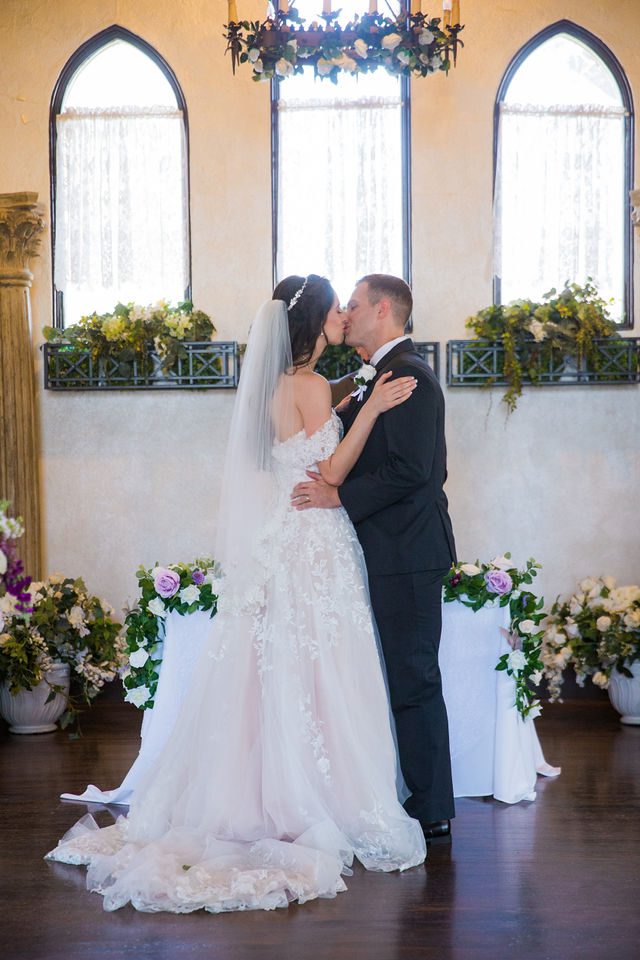 Graysen wedding ceremony in Comfort bride and groom kiss