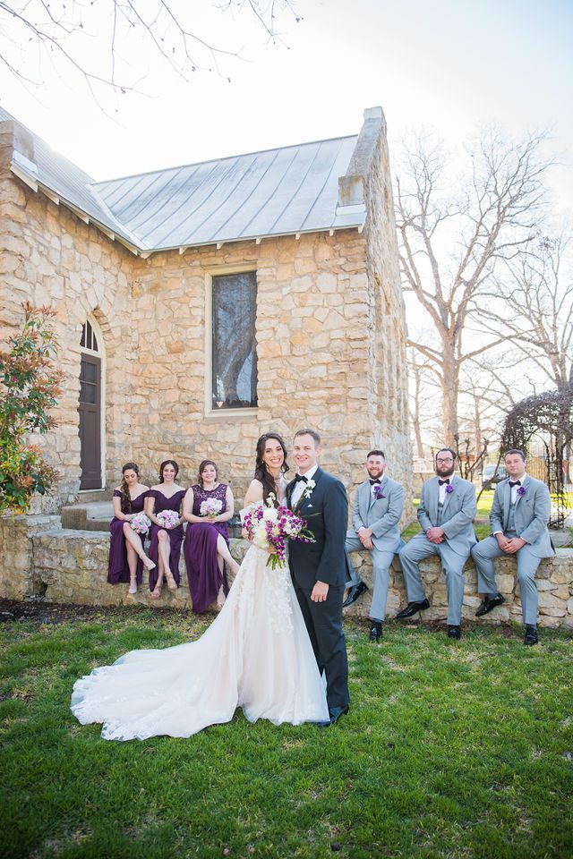 Graysen wedding ceremony in Comfort bridal party by chapel