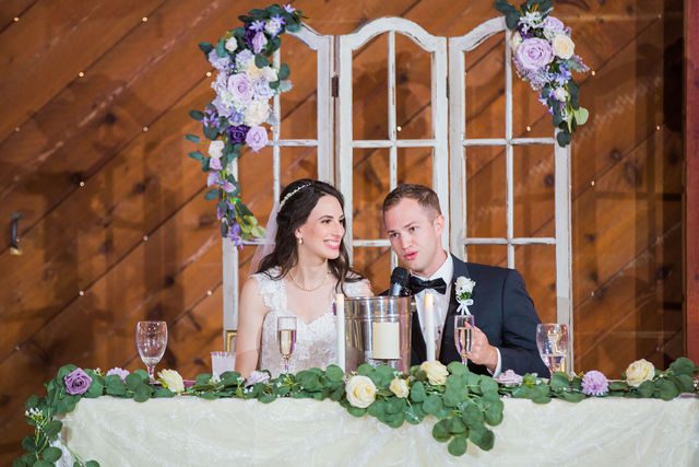 Graysen wedding ceremony in Comfort reception toasts with couple