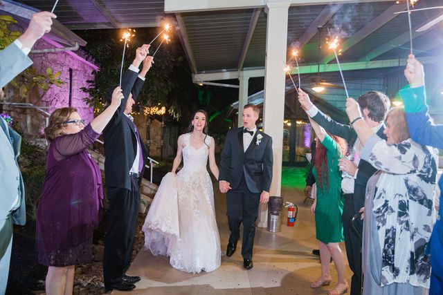 Graysen wedding ceremony in Comfort reception sparkler exit