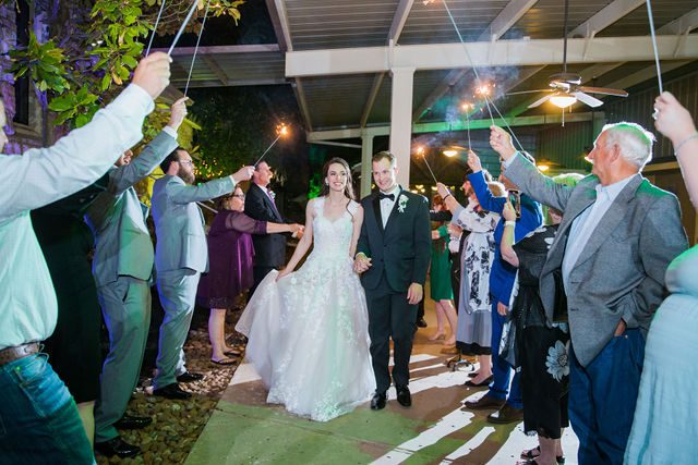 Graysen wedding ceremony in Comfort reception sparkler exit fun