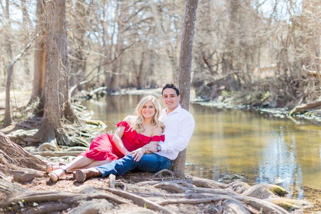 Heath's Engagement session Cibolo Natural Area sitting by the river