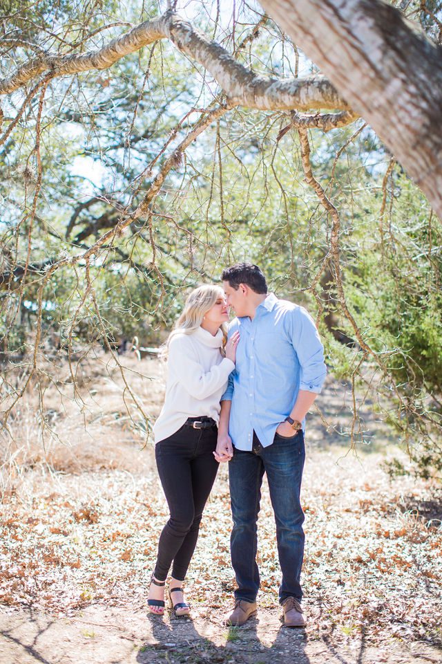 Heath's Engagement session Cibolo Natural Area under the trees nose-bump