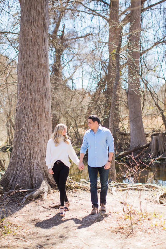 Heath's Engagement session Cibolo Natural Area walking by the river