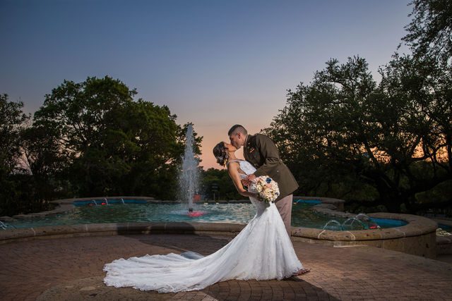 Kylee's wedding at the McNay reception portrait at sunset dip kiss