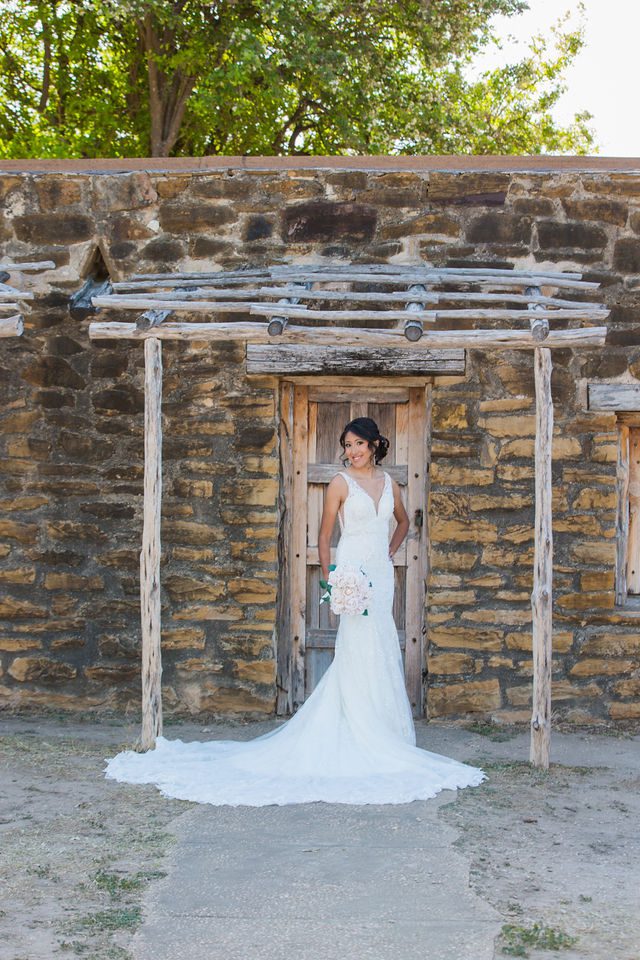 Kylee's bridal at Mission San Jose in the quarters doorway